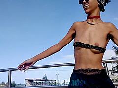 Skinny Latina dances topless flashing pussy publicly