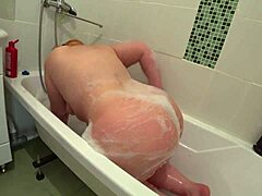 a plump redhead milf bathes with toys. her big ass shakes doggystyle pawg orgasm