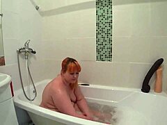 a plump redhead milf bathes with toys. her big ass shakes doggystyle pawg orgasm