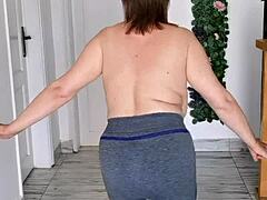 giant mature boobs swing wildly bra-less to music striptease