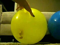 Sophie masturbates wildly with balloons in living room bathroom