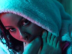 a busty latina lesbian babe caresses her girlfriend's bare feet toes and soles in intimate play moaning softly together