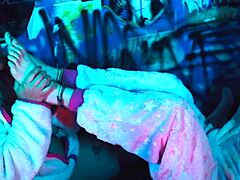 a busty latina lesbian babe caresses her girlfriend's bare feet toes and soles in intimate play moaning softly together