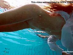 Lola's Big Natural Tits Swim Underwater